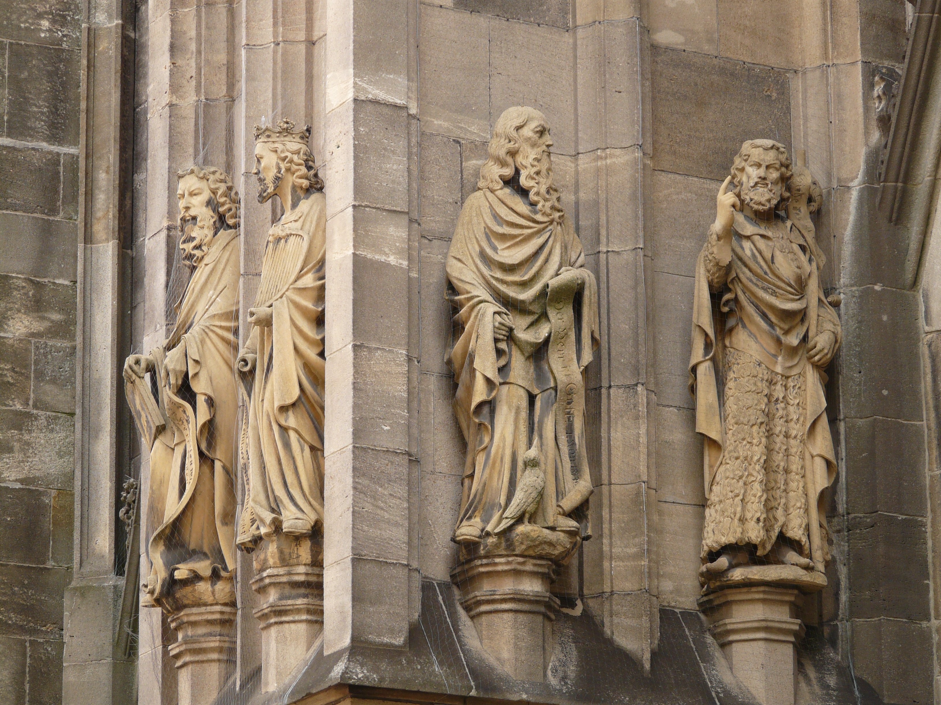 4 religious man statue