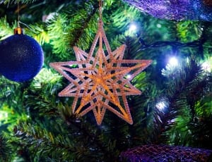 brown star christmas ornament with blue christams bauble thumbnail