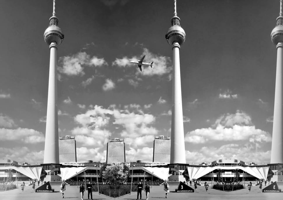 grayscale photography of tower under clear sky during daytime preview
