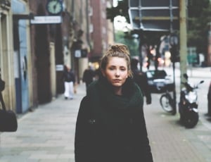 woman wearing black coat photo thumbnail