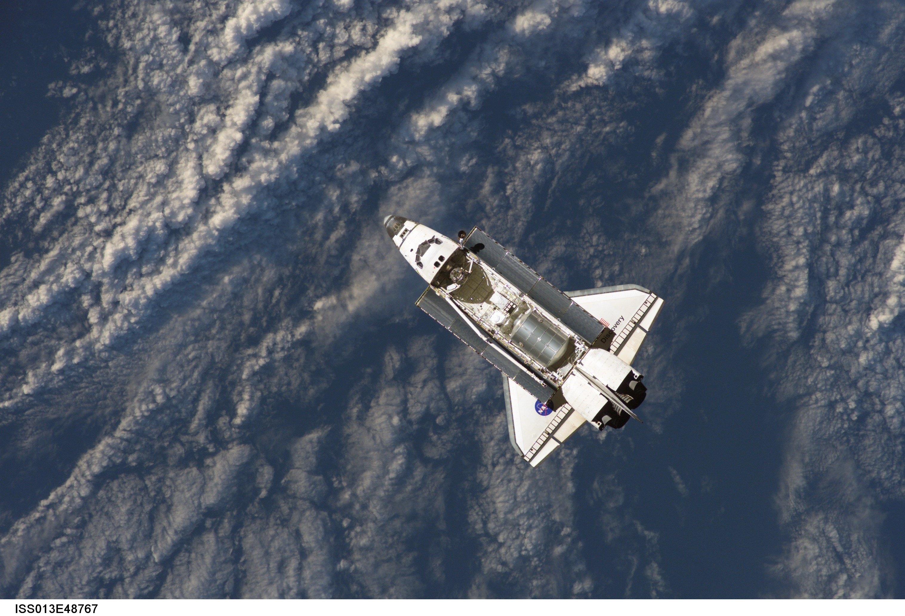 white and gray space shuttle