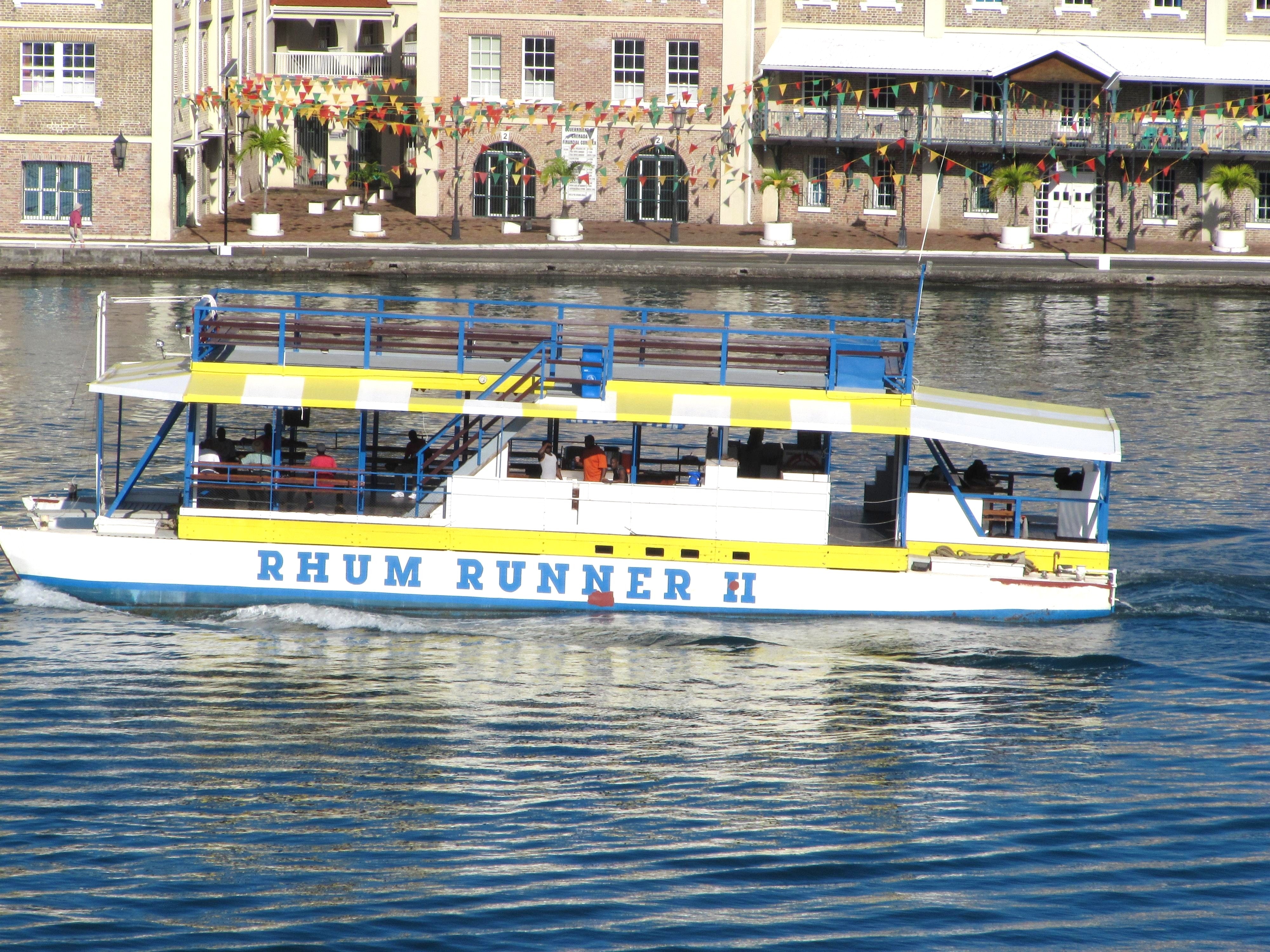 white and yellow rhum runner II ferry