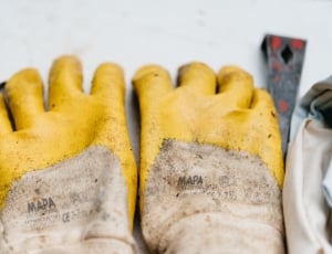 pair of yellow rubber gloves shown thumbnail