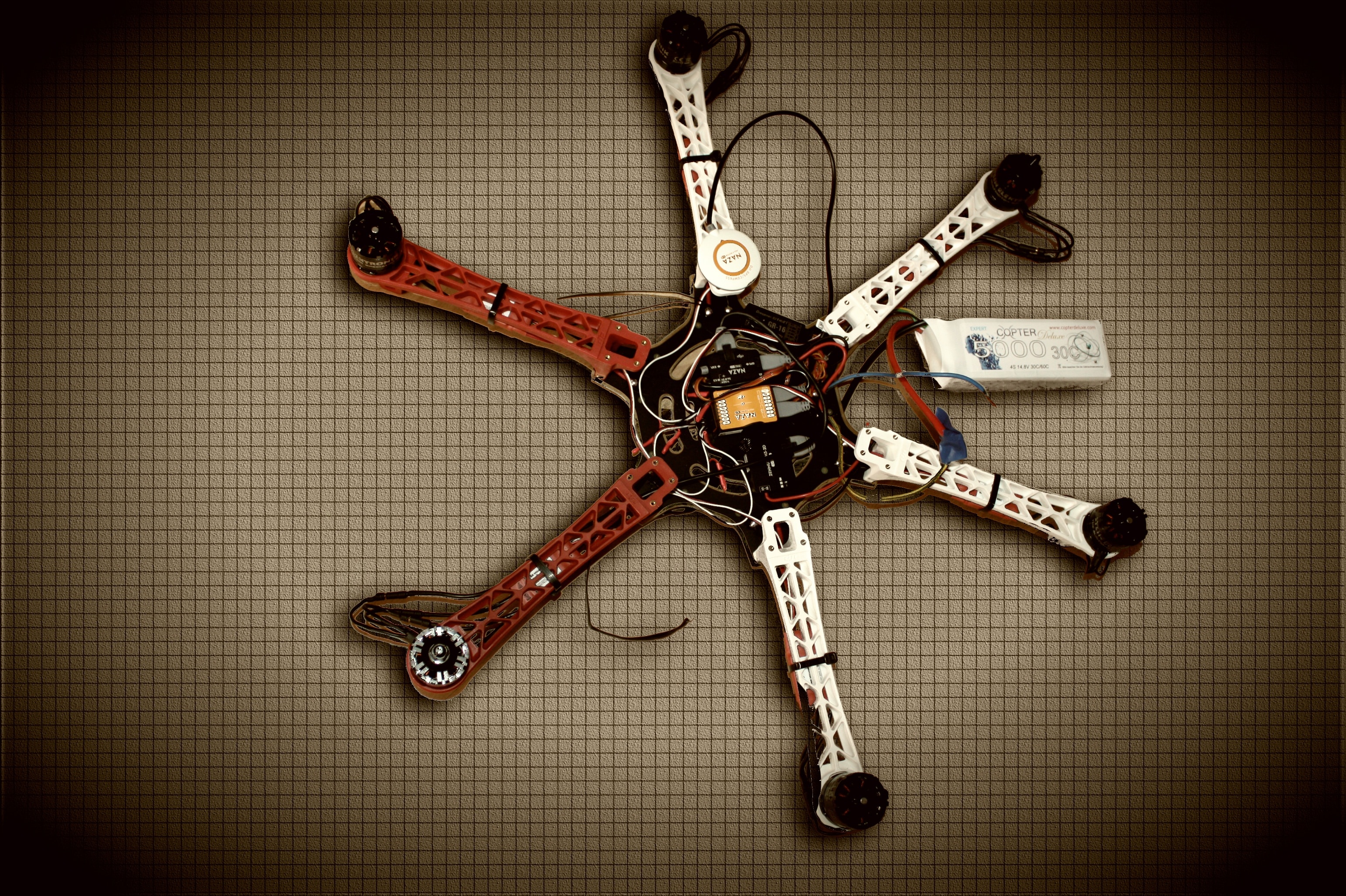white and red hexacopter