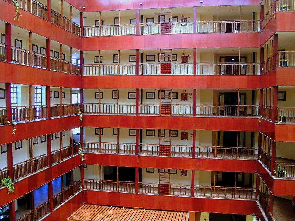 red and white concrete condominium preview