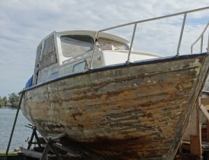 rusty power boat offshore thumbnail