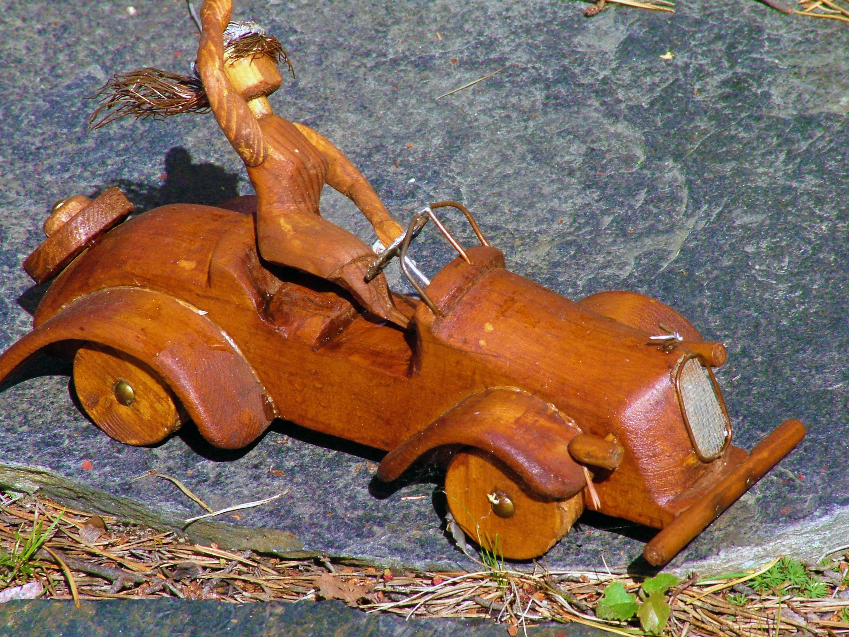 brown wooden car scale model