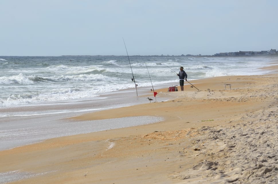 fishing rods in sand preview