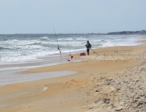 fishing rods in sand thumbnail