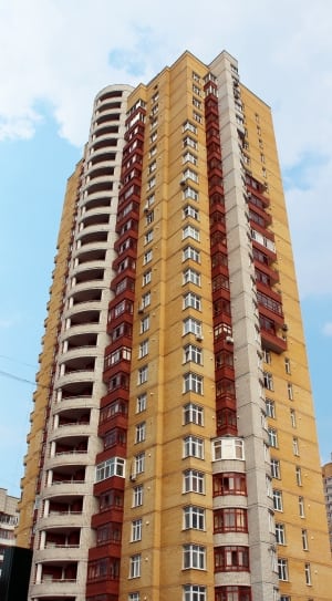 yellow red and beige concrete high rise building thumbnail