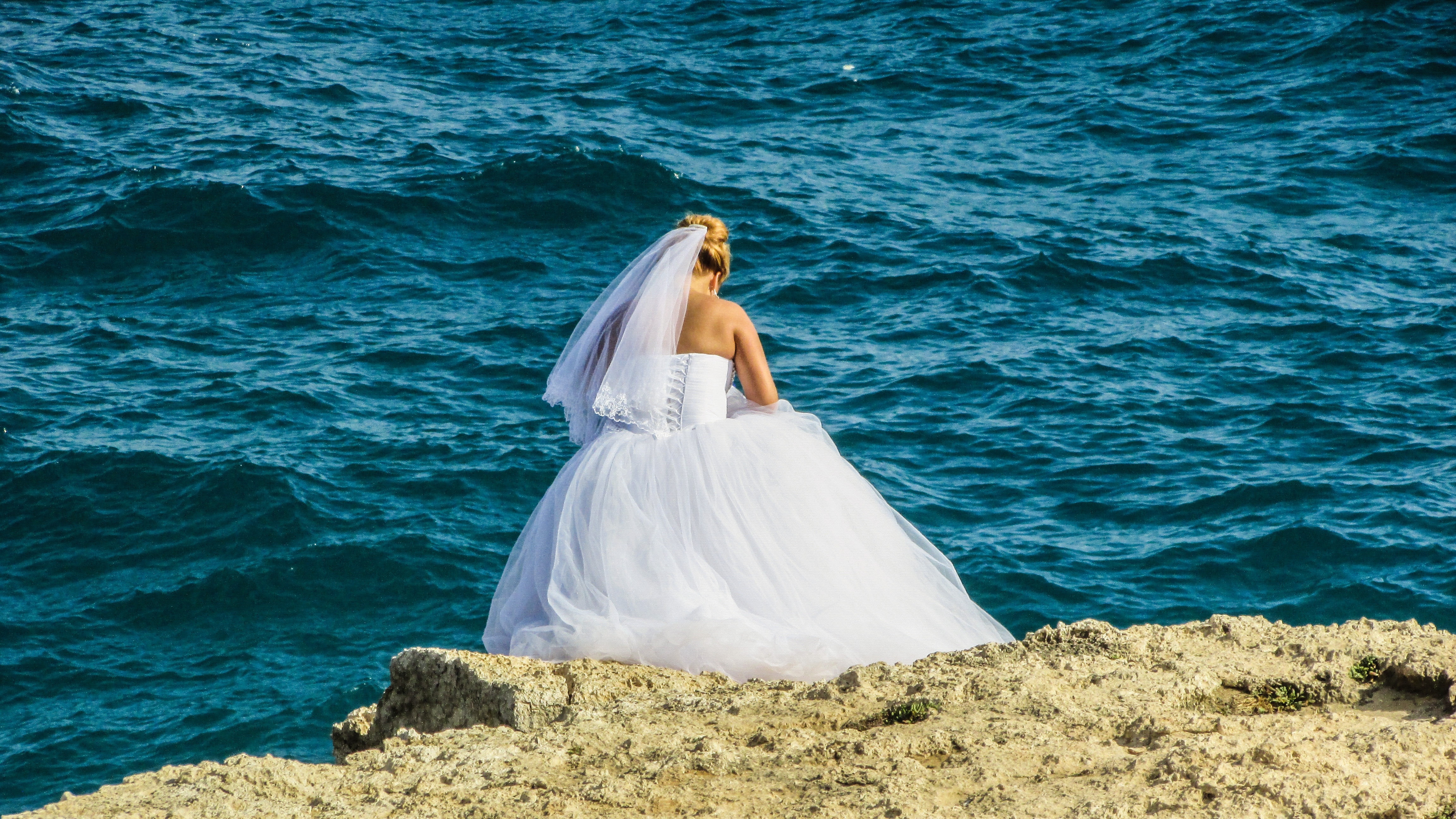 women's white strapless bridal gown