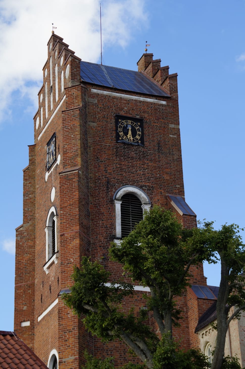 brown brick church tower preview