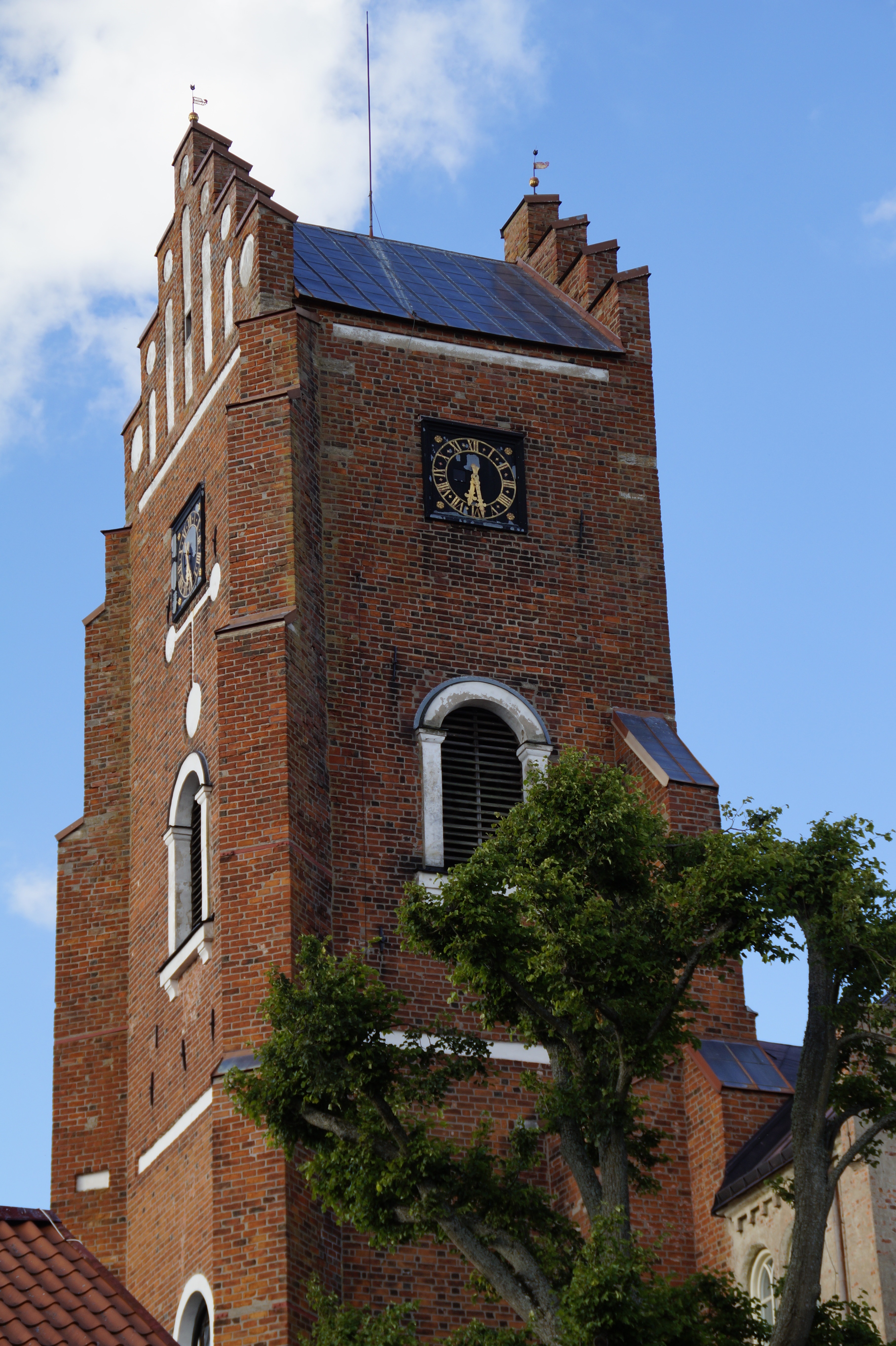 brown brick church tower