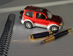 red suv toy car thumbnail