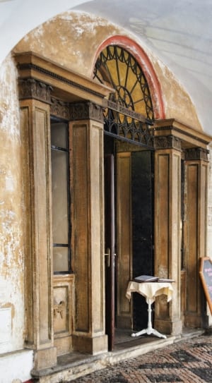 white pedestal round desk with brown curtain thumbnail