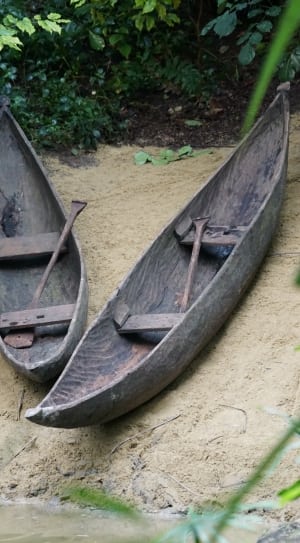 2 brown wooden boats thumbnail