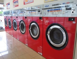 red and black 6 front load washing machines thumbnail