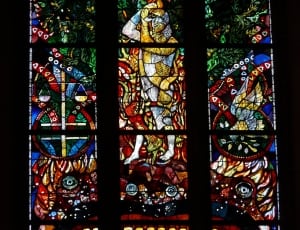 green red and yellow religious theme stained glass thumbnail