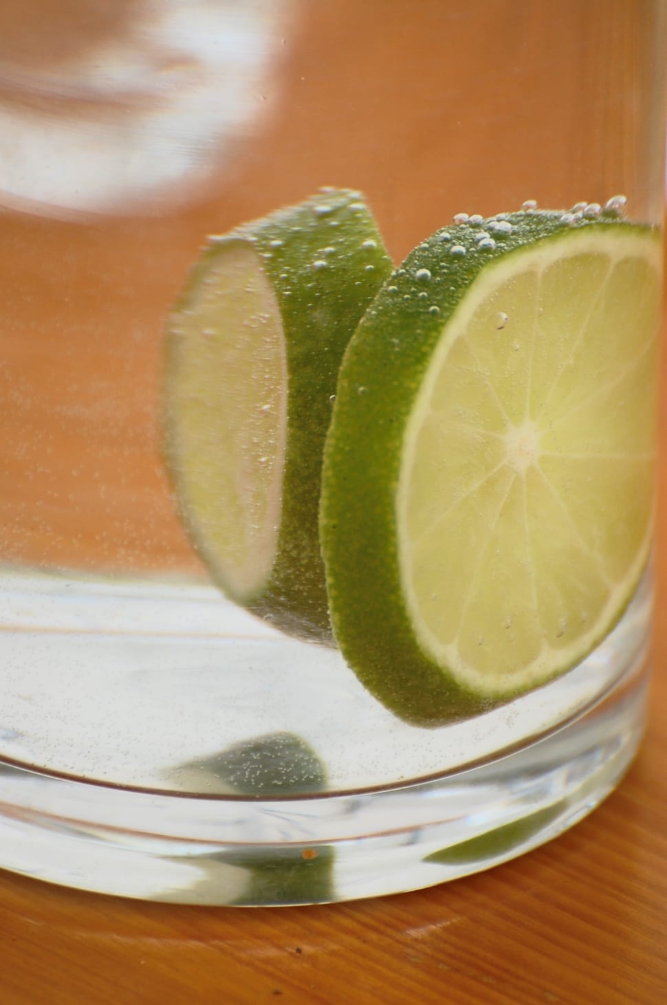 clear drinking glass with lime garnish preview