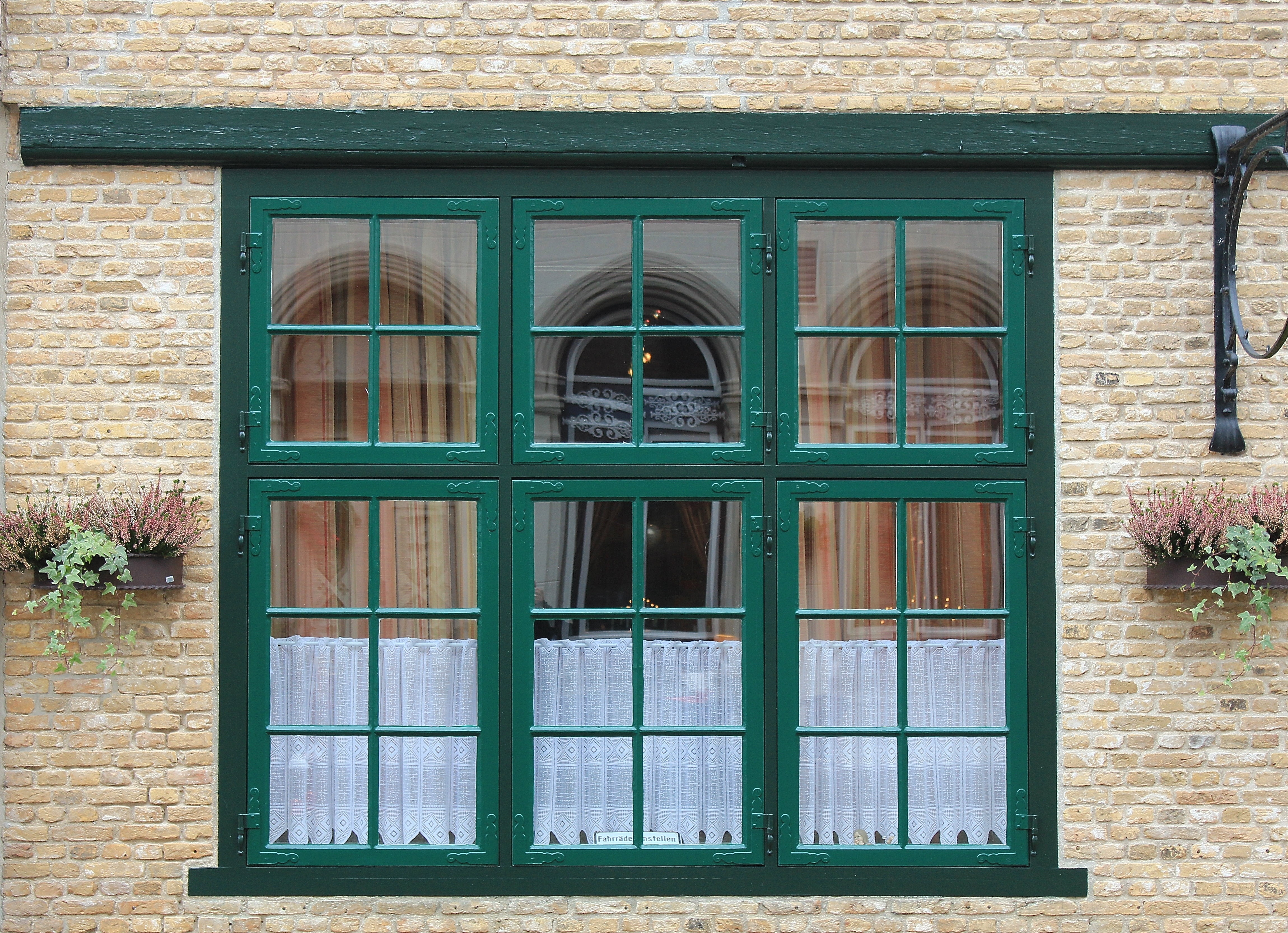 green metal casement window