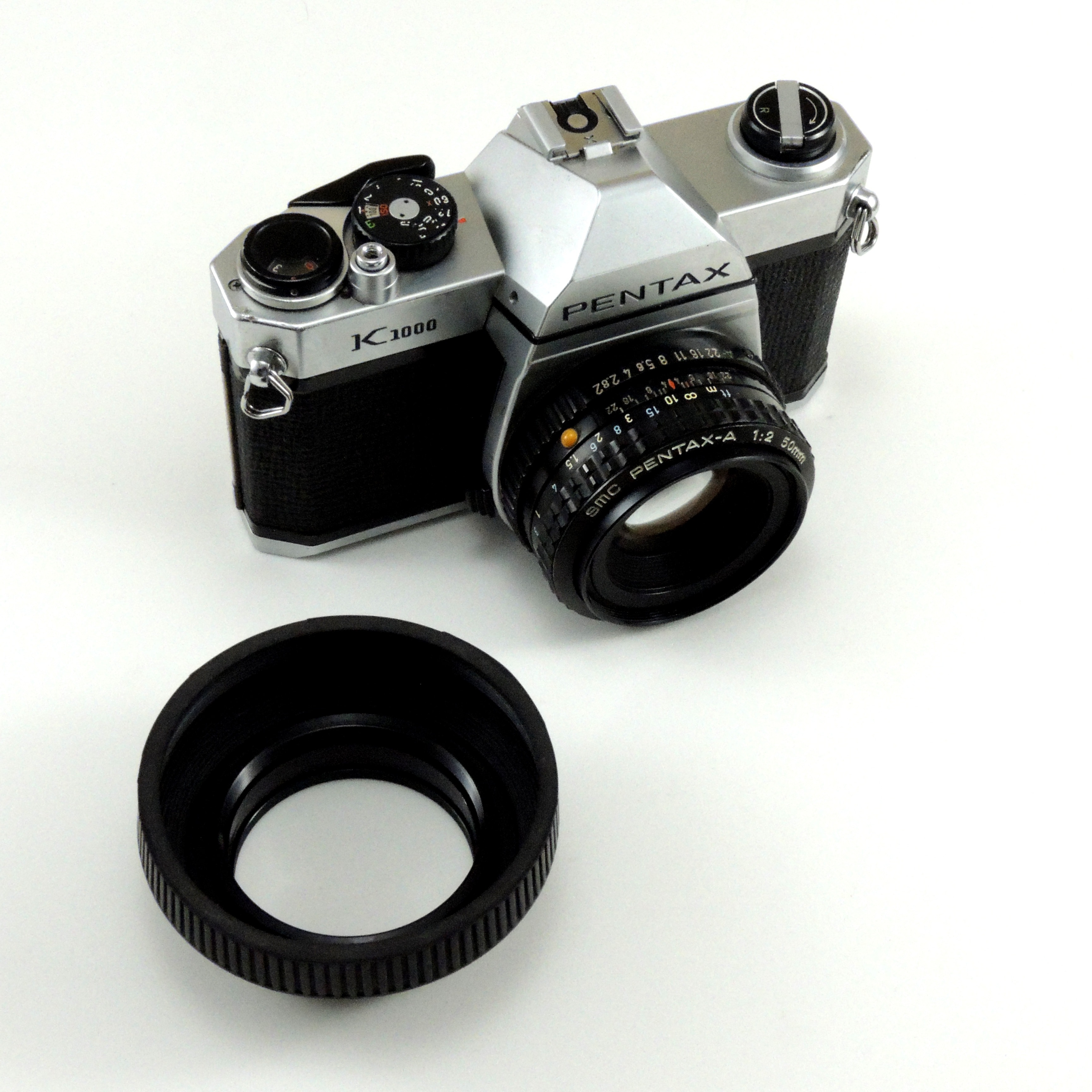 grey and black pentax k1000 camera