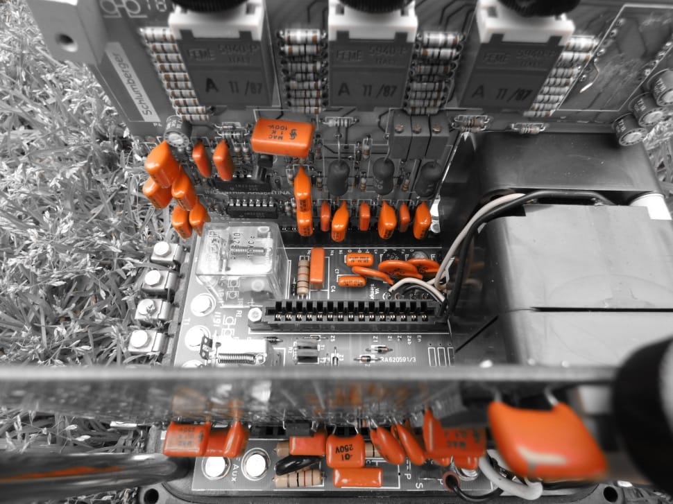 gray and orange circuit board and orange integrated chips lot preview