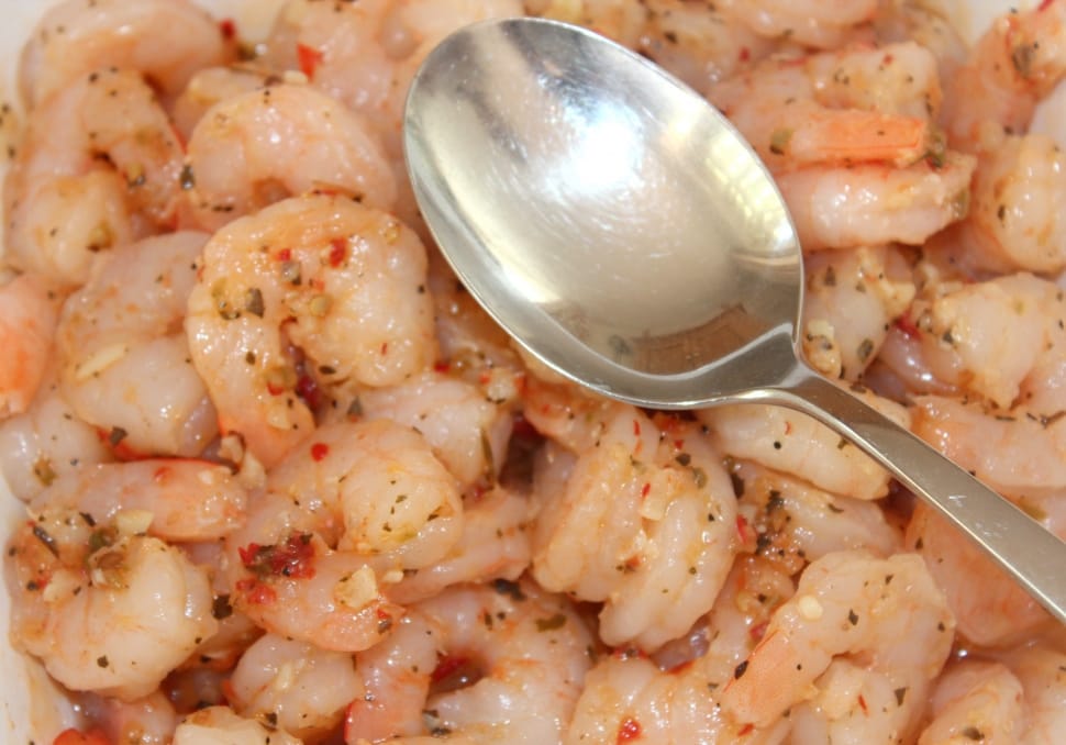 cooked shrimps and stainless steel spoon preview