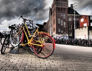 netherlands bikes building sidewalk photo thumbnail