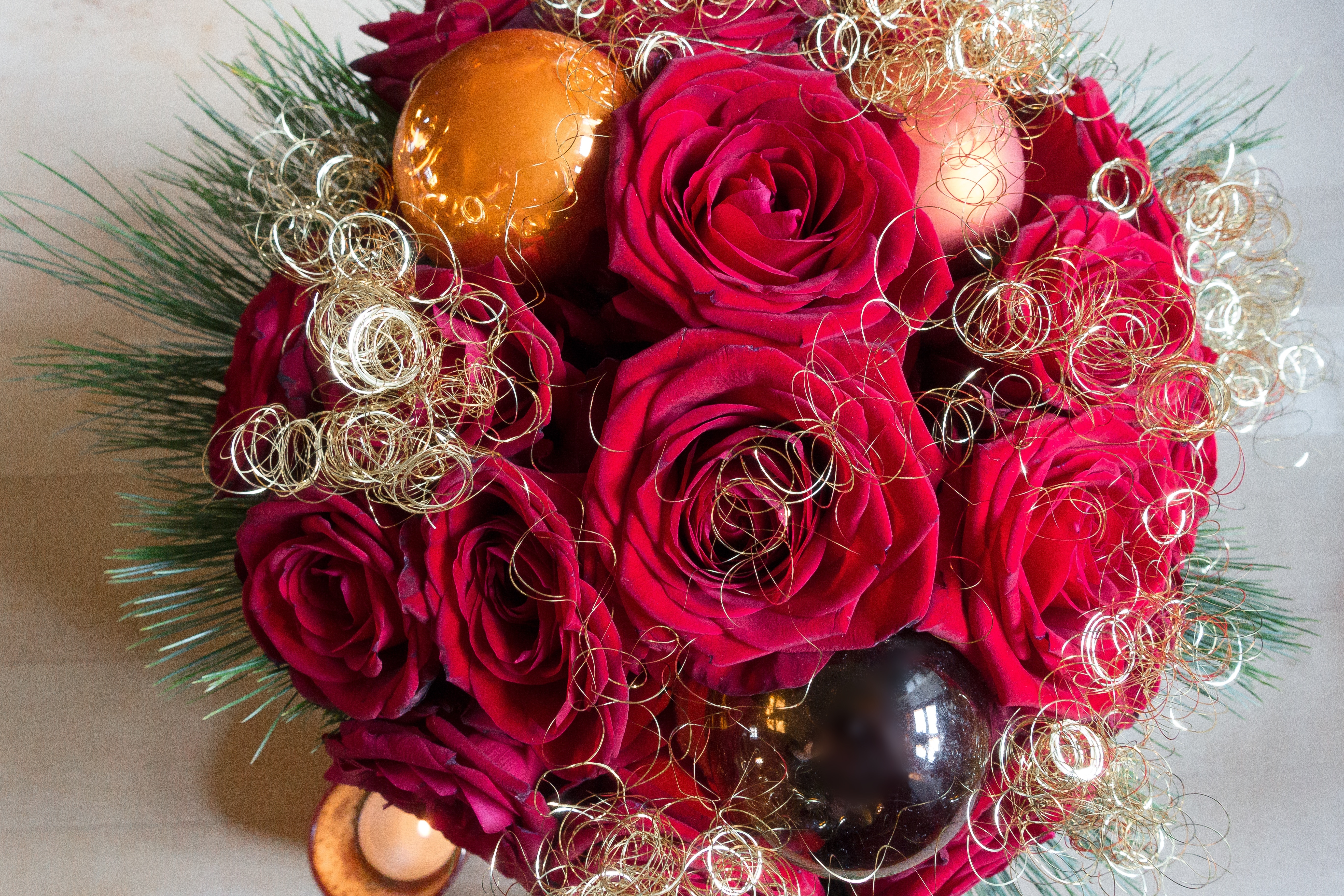 red flower bouquet with bauble