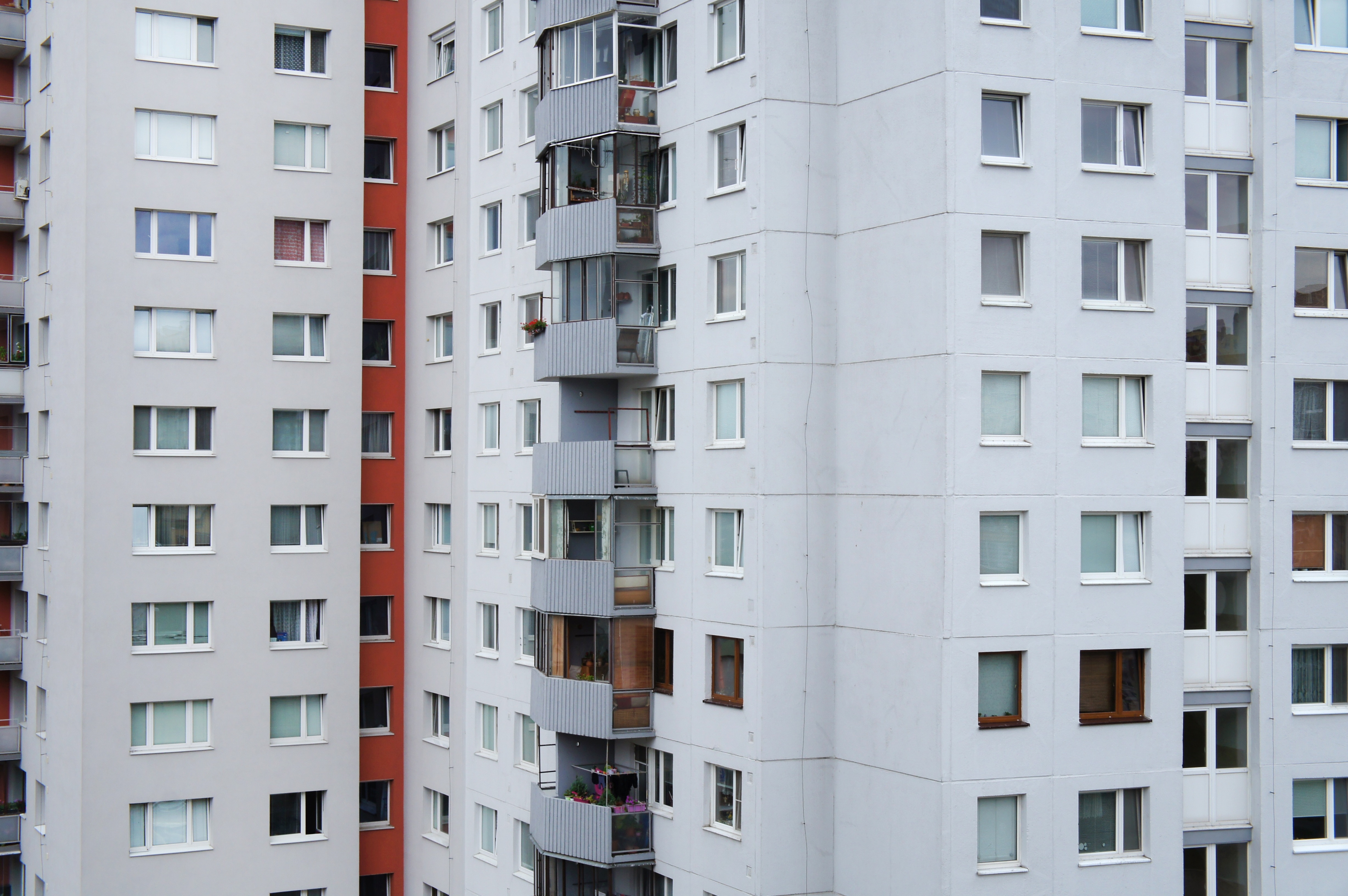 white gray and orange condominium building