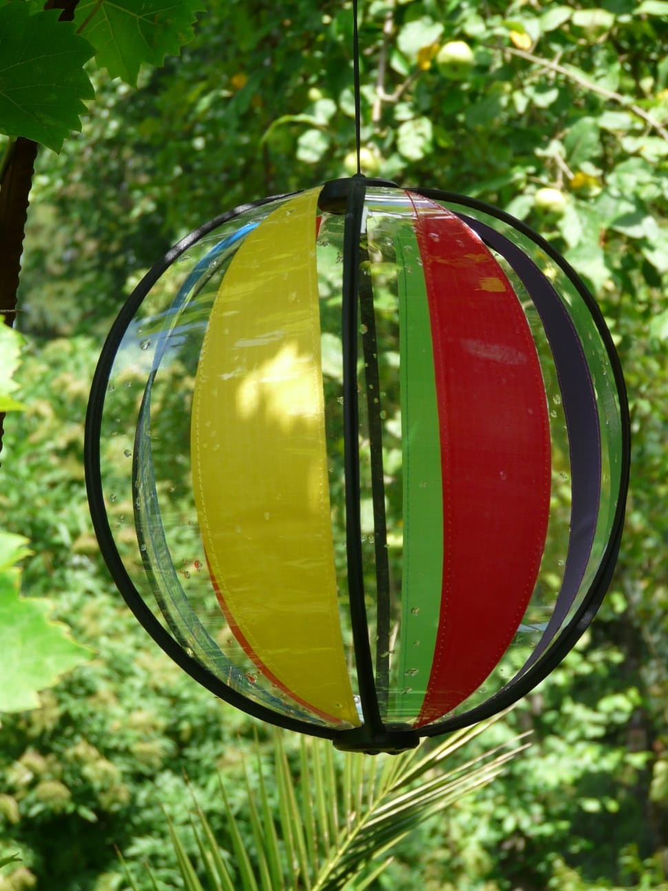 yellow red and black printed hanging ball decor preview