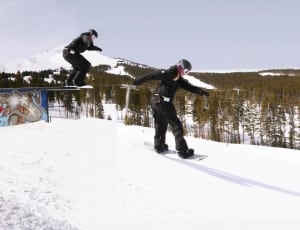 person riding snowboard jumping ramp during daytime thumbnail