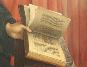 painting of person holding book thumbnail