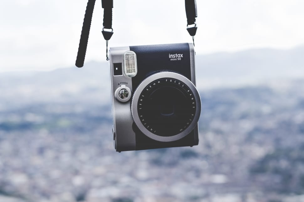 black and gray instax compact camera preview