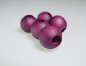 five purple wooden beads thumbnail