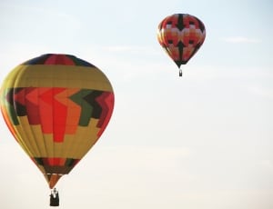 2 multicolored hot air balloons thumbnail