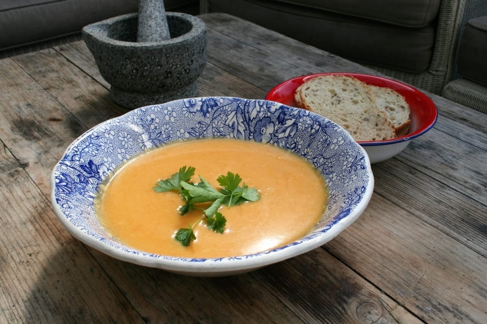 delft ceramic bowl and vegetable soup and sliced bread preview