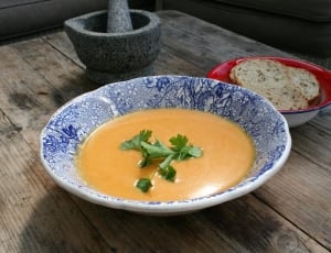 delft ceramic bowl and vegetable soup and sliced bread thumbnail