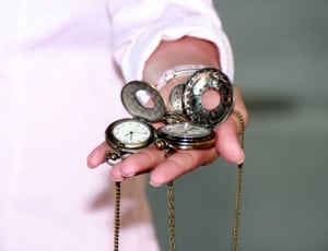 two silver pocket watches thumbnail