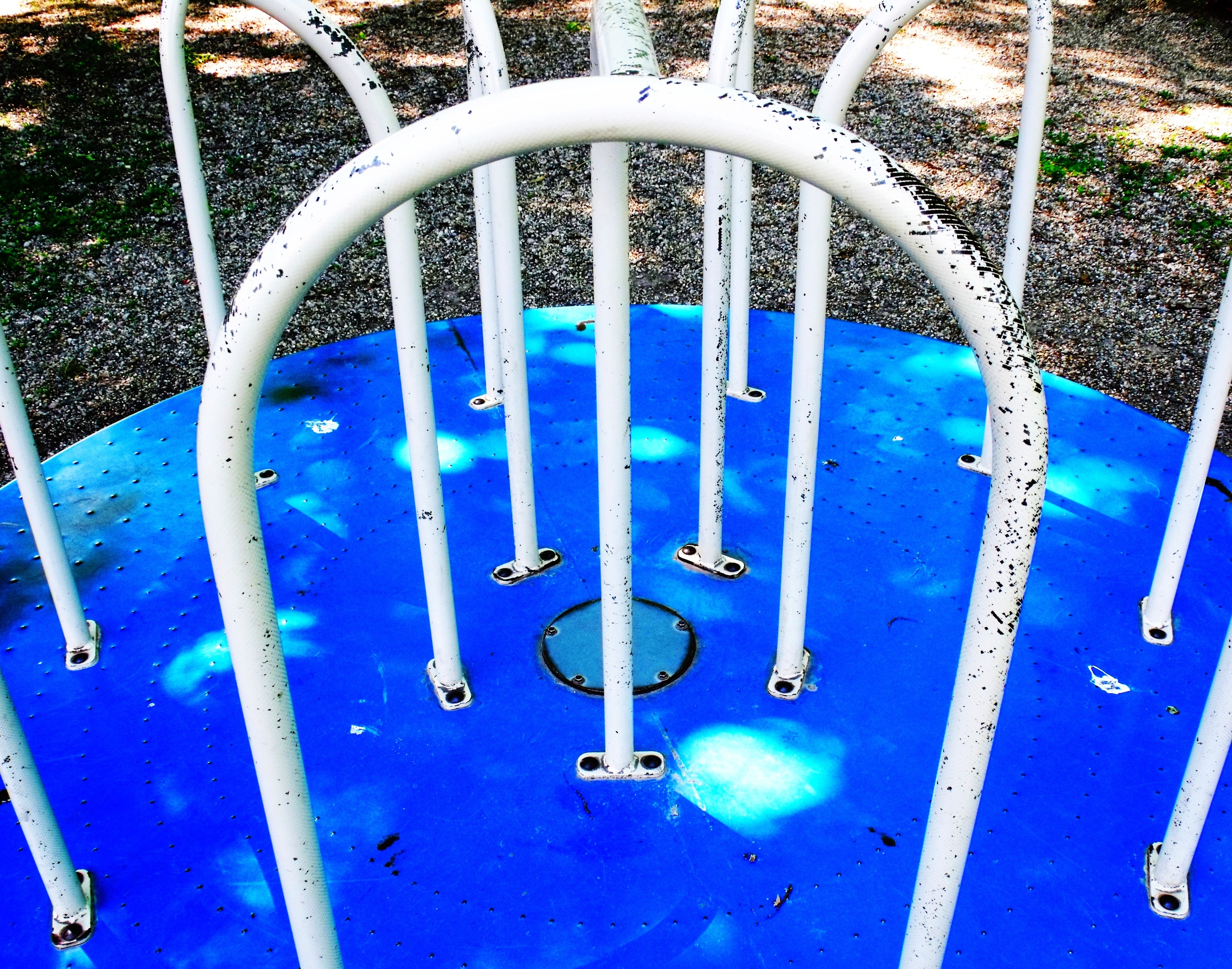 blue and white metal playground toy