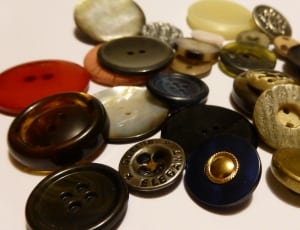 close up photography of assorted buttons thumbnail