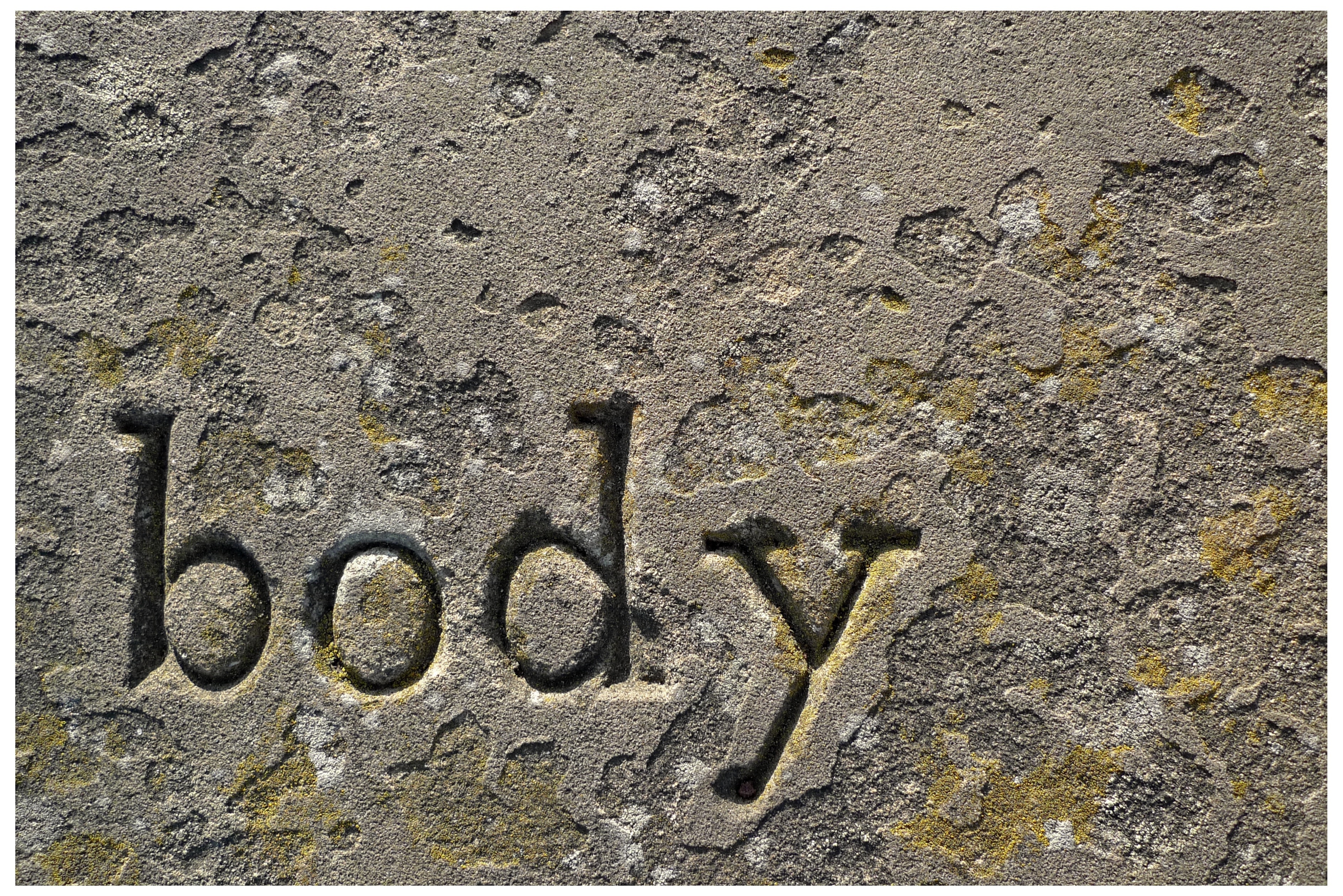 grey concrete body engraved artwork