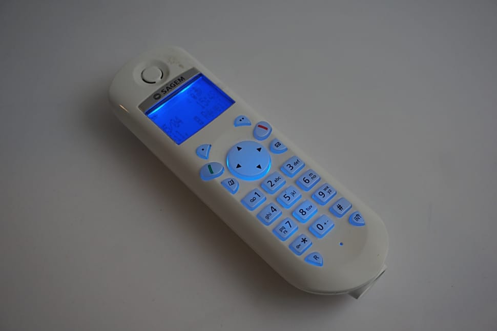 white and blue remote control preview