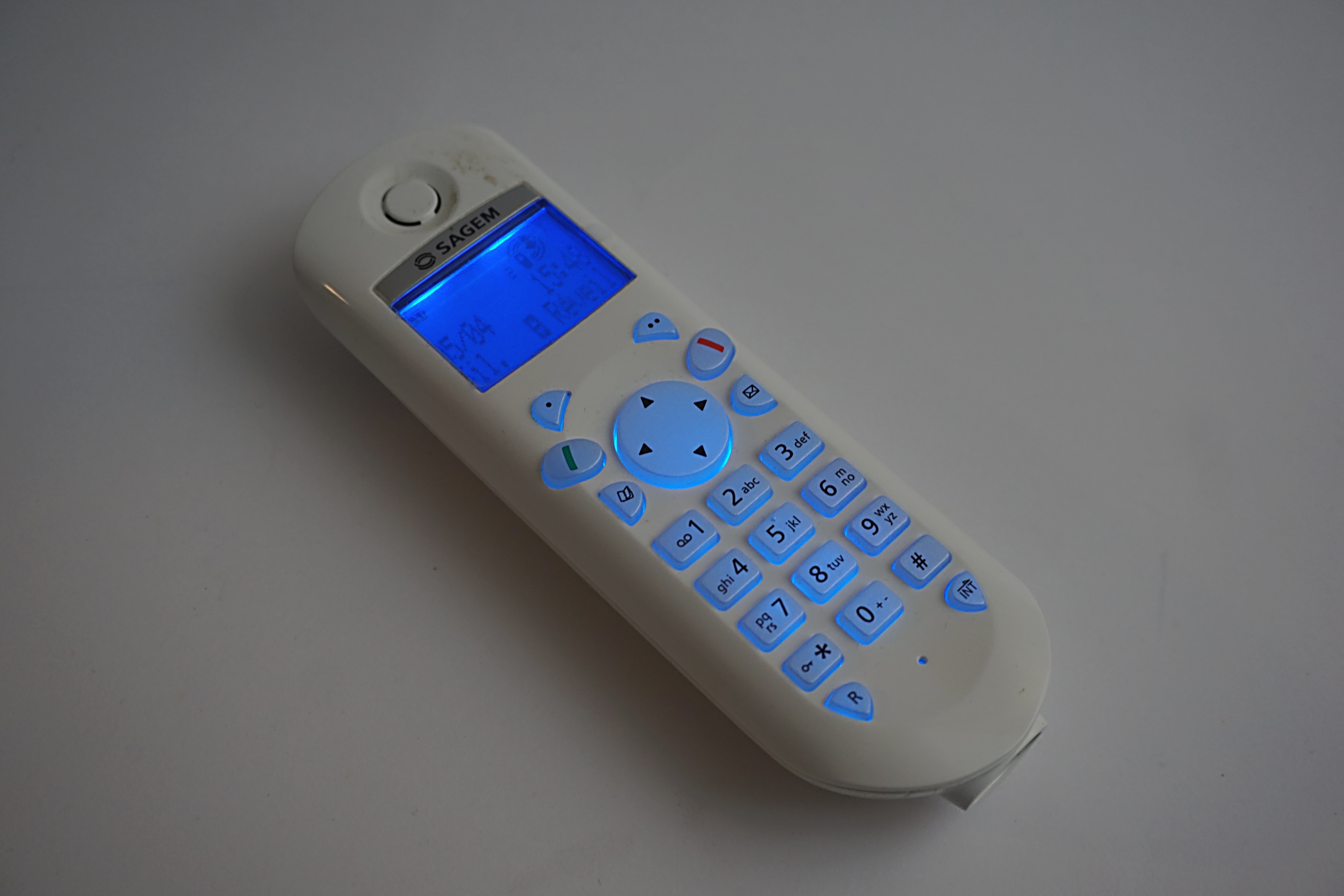 white and blue remote control