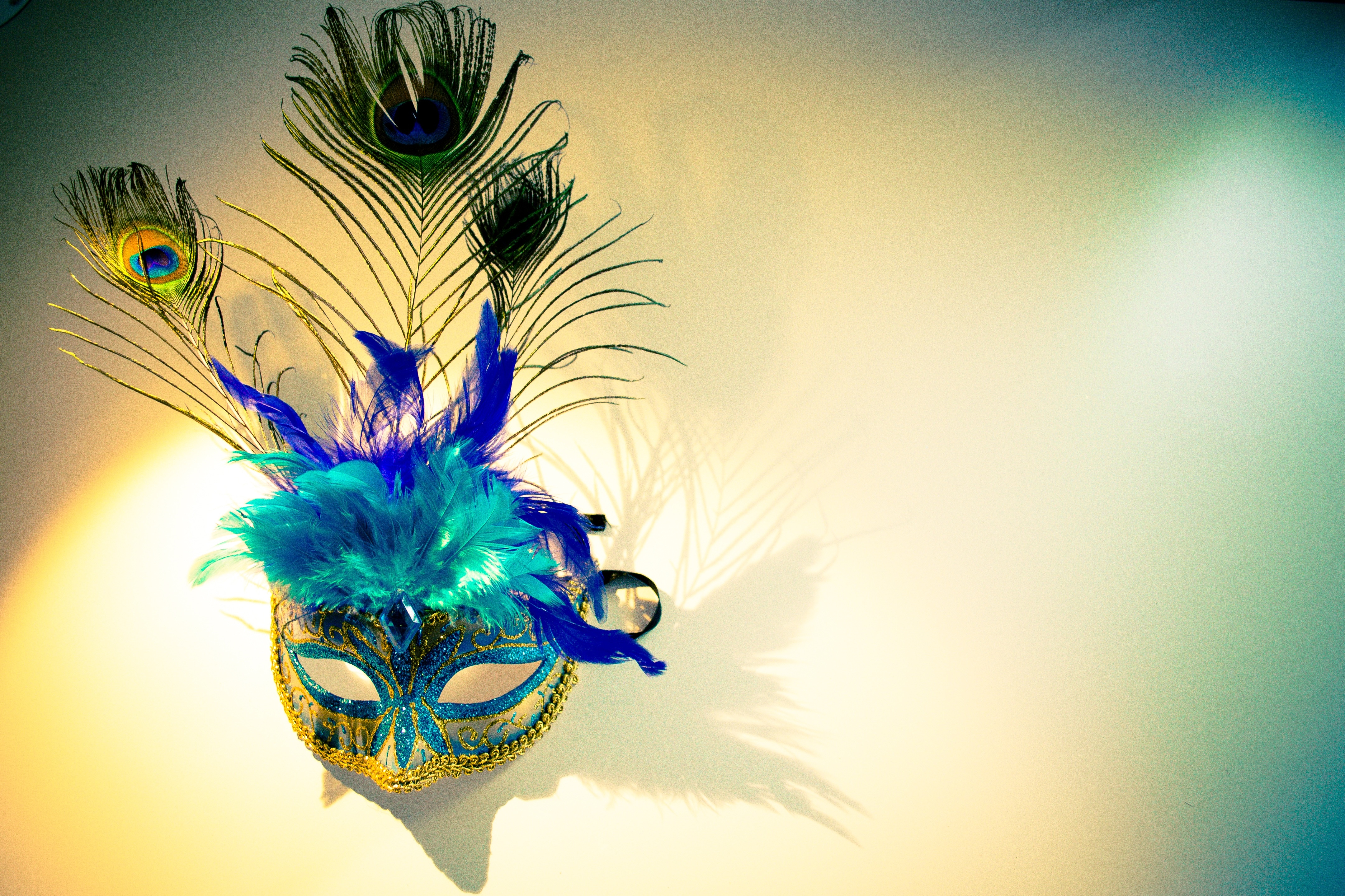 yellow teal blue and black masquerade