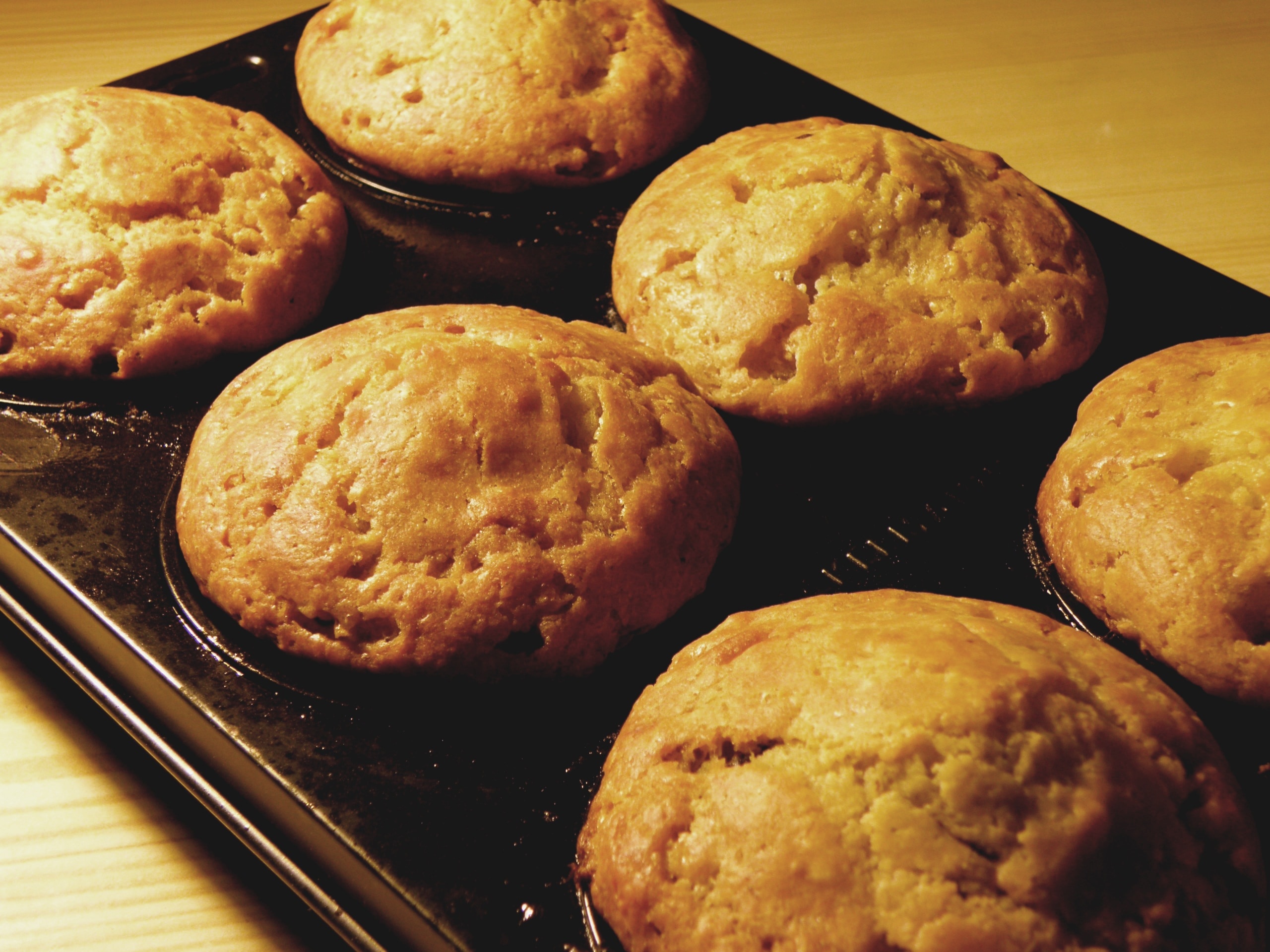 six brown muffins