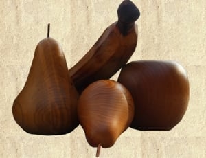 brown wood fruit sculptures thumbnail