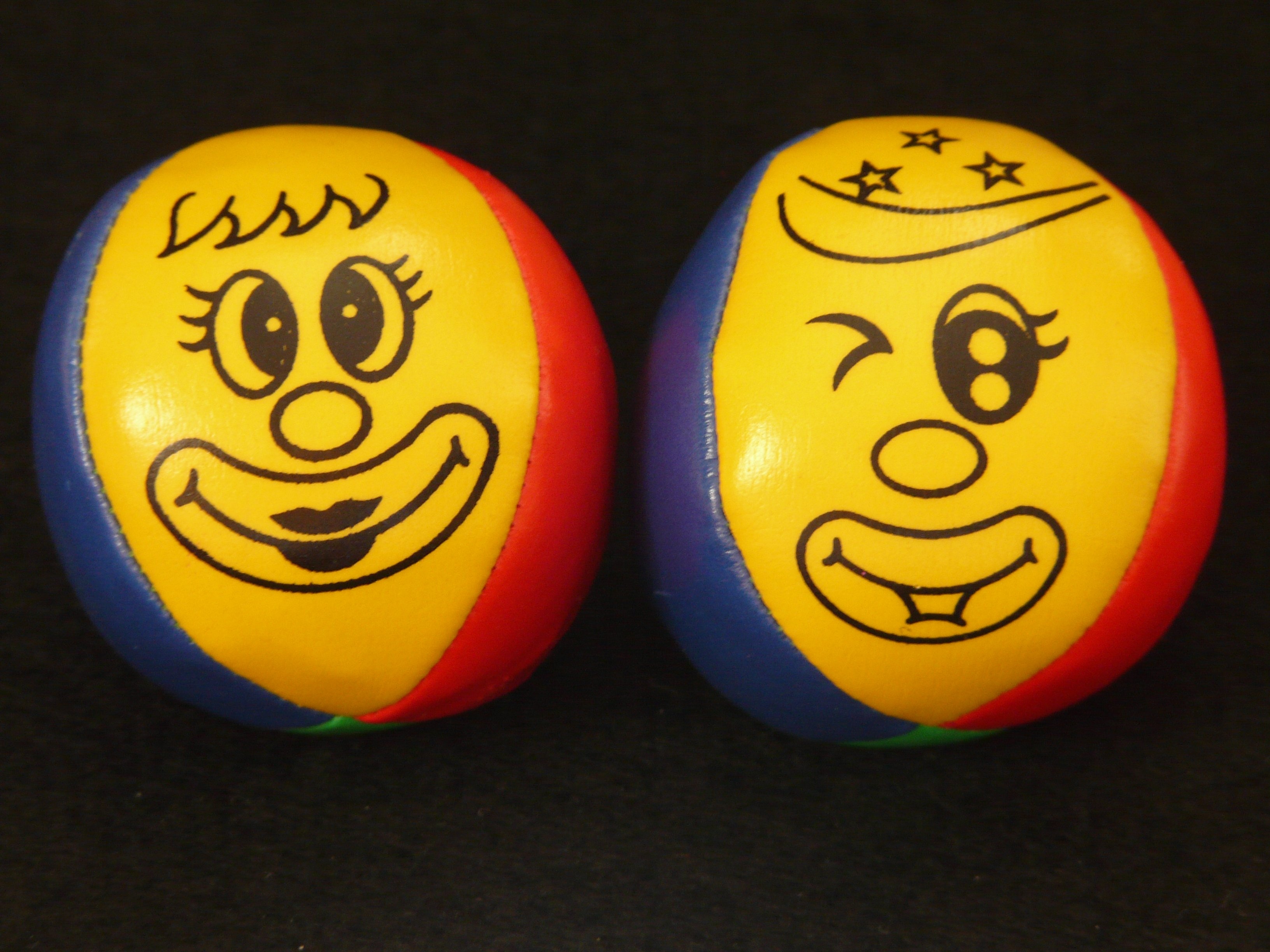 2 yellow blue and red ball