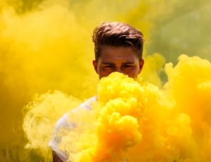 man in white shirt surrounded by yellow fog thumbnail