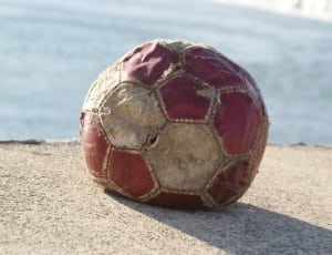 maroon and white soccer ball thumbnail